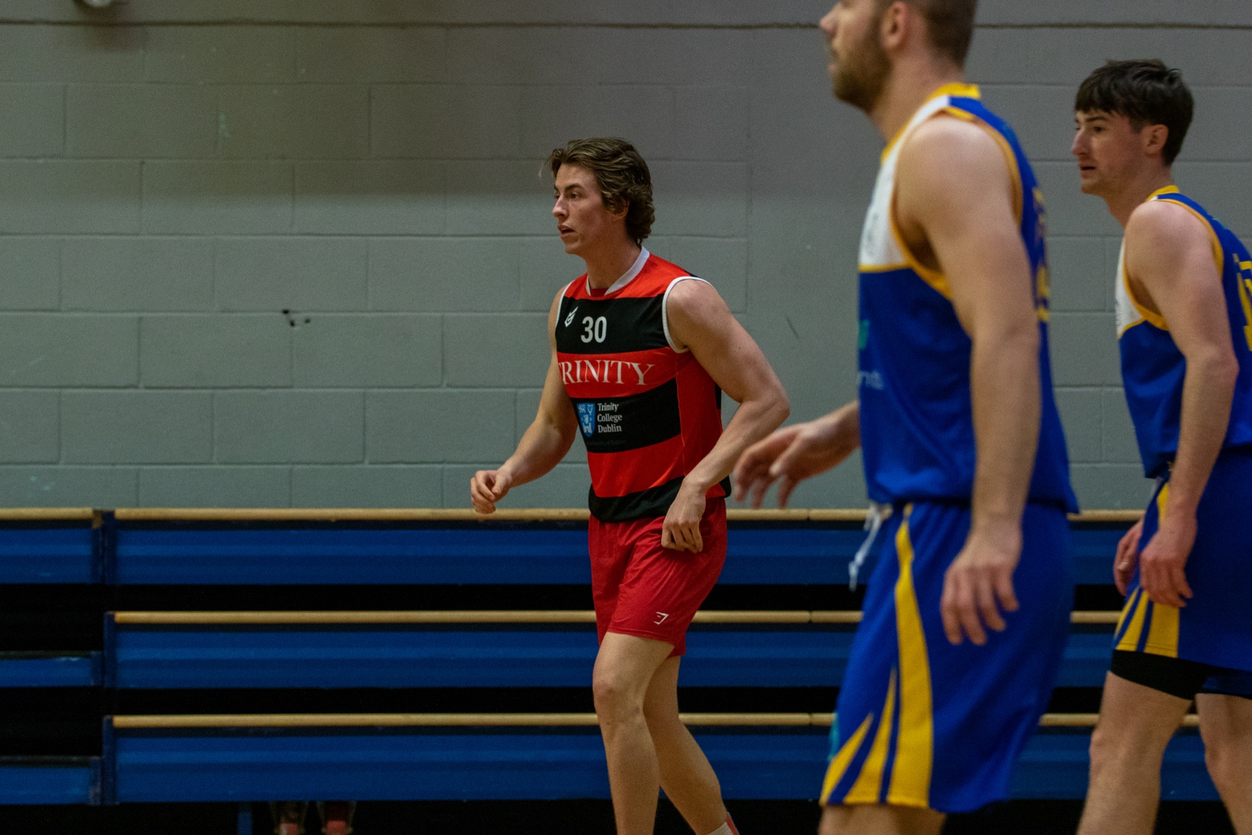 Jack playing basketball for Trinity